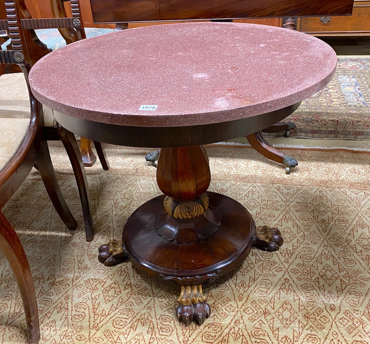 A Victorian parcel gilt rosewood pedestal now as an occasional table with circular faux porphyry marble top diameter 73cms, height 62cms.